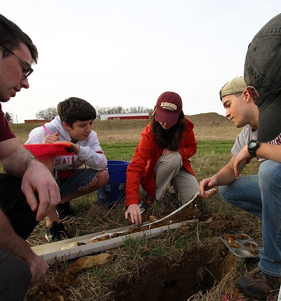 Environmental geoscience conduct soil sampling on upper campus 