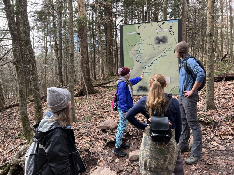 Hikers looking at map