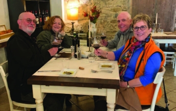 Long-time friends Kerby and Judy Confer on the right and Steve and Kathy Kirk on the left on a recent trip to Italy.