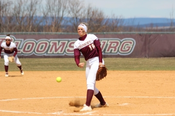 Alyssa Davies '18 delivers a pitch on her home field