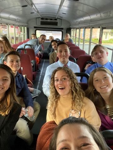 A group of Bloomsburg University students on the bus to the Eurofins facility in the Lehigh Valley during a Husky Career Road Trip