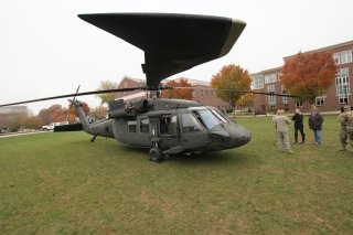 A Blackhawk helicopter lands on the Academic Quad during Veterans Week at Bloomsburg University.