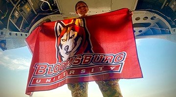 Alumna displays her school pride while on deployment in Iraq with the U.S. Army