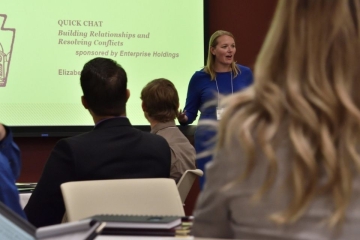 Elizabeth Brinley from Enterprise Holdings speaks to a group of BU students at the Career Intensive Boot Camp