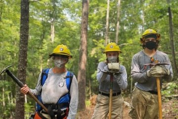 Amanda Settembrino (first from left) works with other AmeriCorps volunteers
