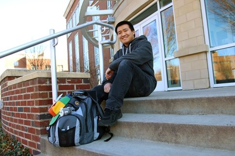 Economics major reflects on his time at Bloomsburg in front of Sutliff Hall