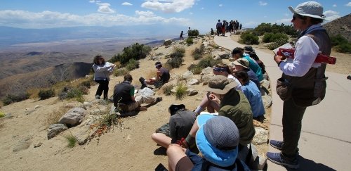 Geology students listen to a lecture during their field course in southern California 