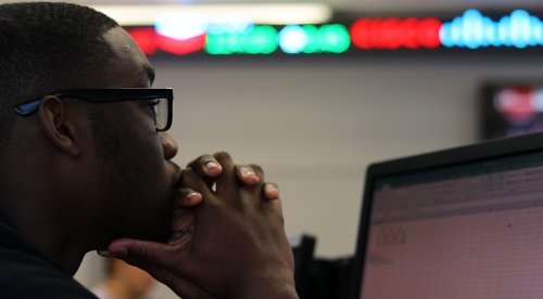 Finance major listens carefully during a lecture in the Benner-Hudock Center for Financial Analysis