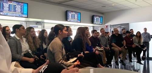 Business students get prepped for their day at Yankee Stadium to observe the marketing profession