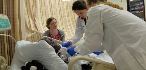 Nursing majors practice bedside manner in the nursing simulation lab in McCormick Center