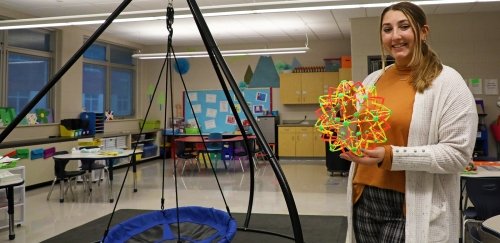 Special education major displays a sensory toy in her autistic support classroom