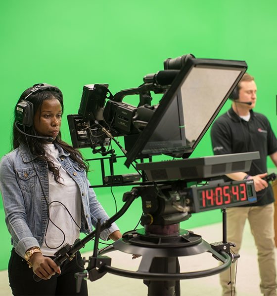 Media and Journalims Telecomm students behind the camera's in BU's state-of-the-art television studio.