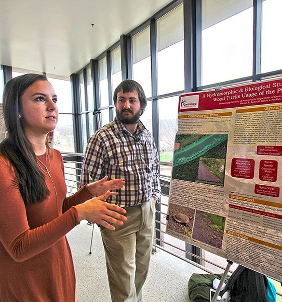 Biology majors discuss their research during the annual COST Research Day