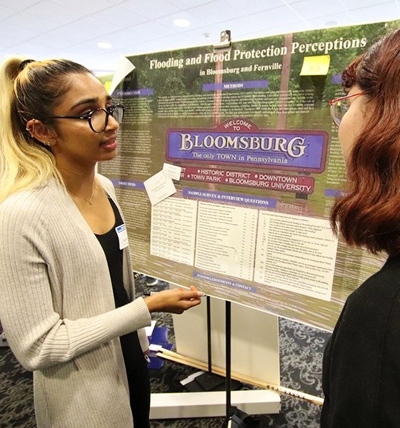 Anthropology major discusses her research at a recent URSCA symposium